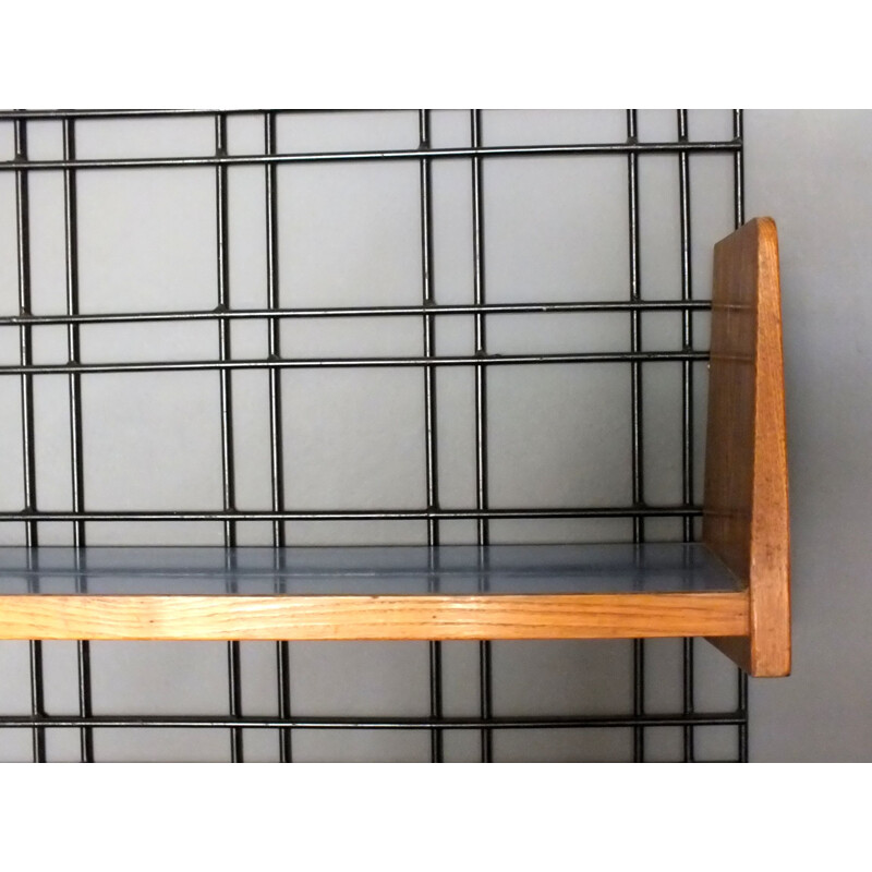 Vintage black lacquered iron wall bookcase with five adjustable shelves from the PFR studio by Gio Ponti, 1950