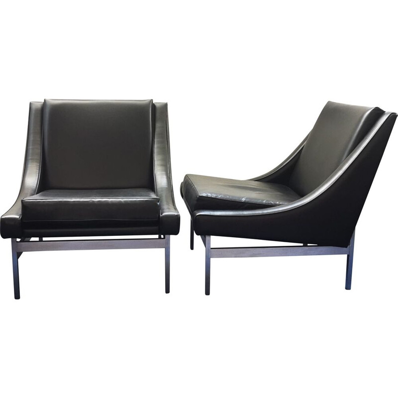 Pair of vintage low armchairs in black leather and chromed metal 1970