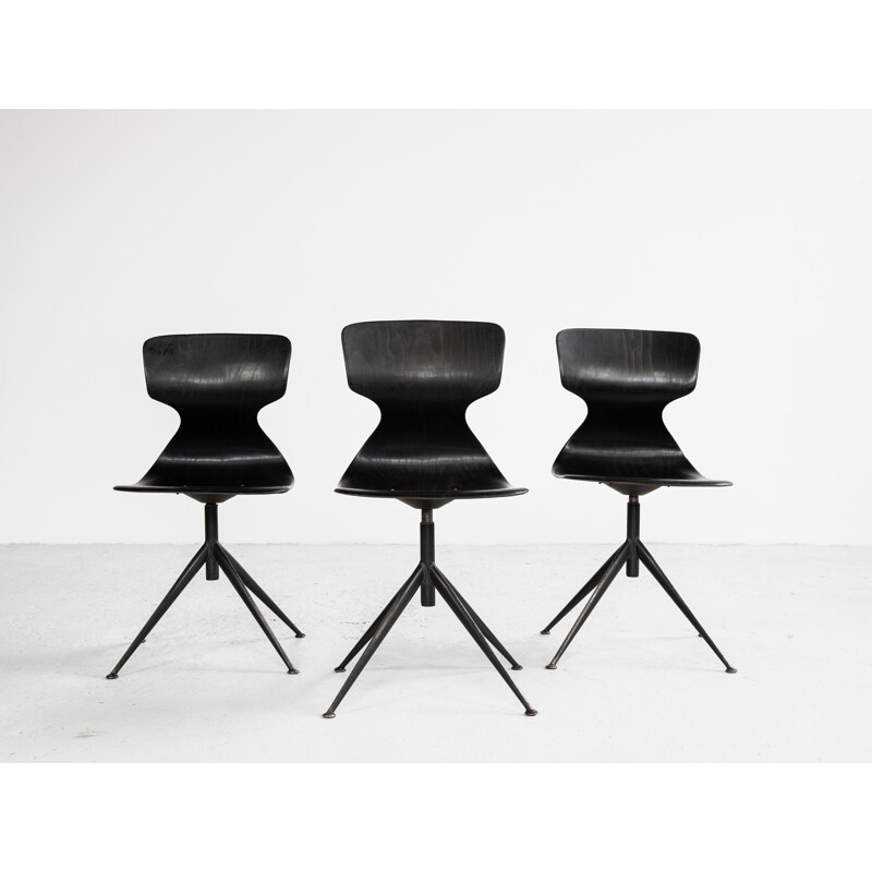 Midcentury industrial black Pagholz chair on central base 1960