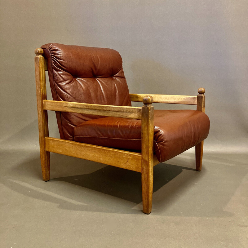 Fauteuil et son ottoman vintage cuir 1950