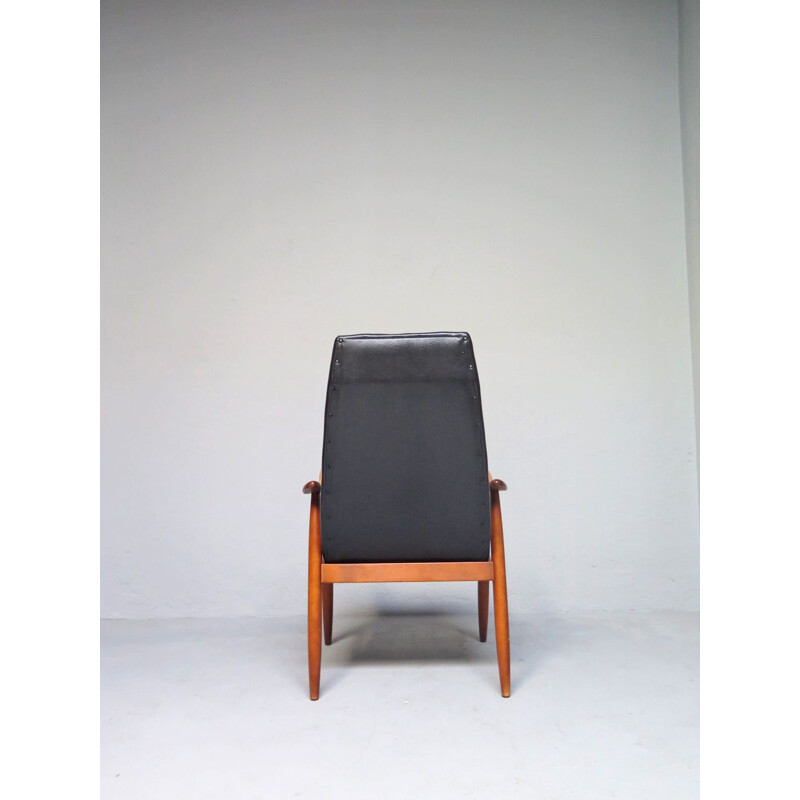 Vintage sculptural armchair in black leatherette, 1950s