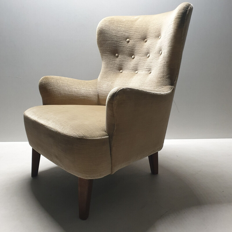 Mid-century velvet wingback lounge chair by Theo Ruth for Artifort (labeled), 1950s