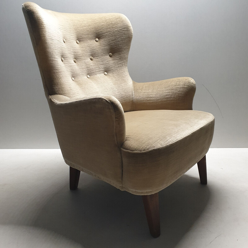 Mid-century velvet wingback lounge chair by Theo Ruth for Artifort (labeled), 1950s