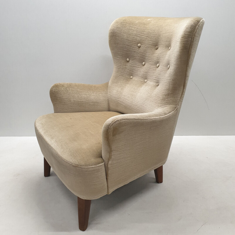 Mid-century velvet wingback lounge chair by Theo Ruth for Artifort (labeled), 1950s