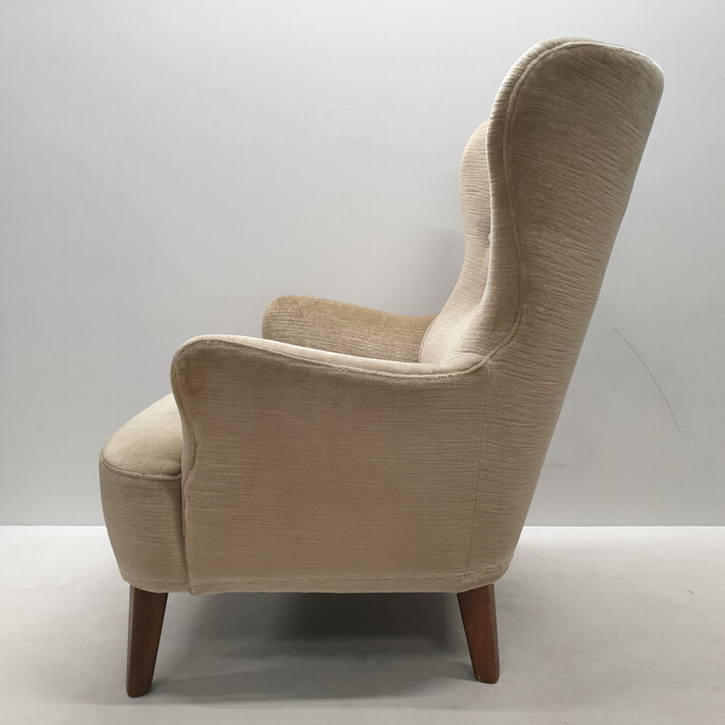 Mid-century velvet wingback lounge chair by Theo Ruth for Artifort (labeled), 1950s