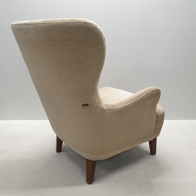 Mid-century velvet wingback lounge chair by Theo Ruth for Artifort (labeled), 1950s