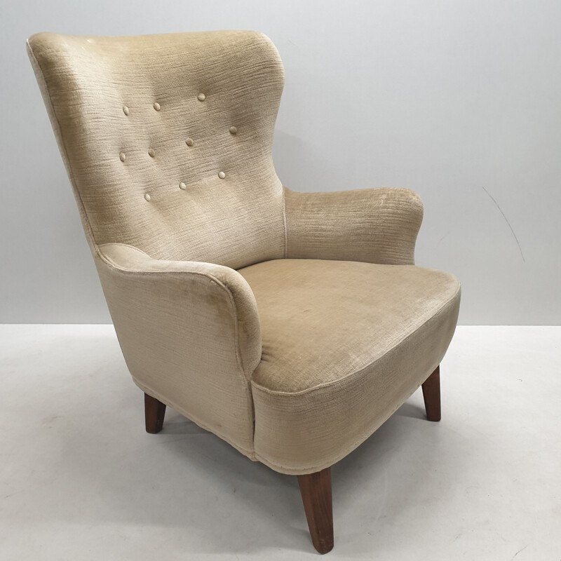 Mid-century velvet wingback lounge chair by Theo Ruth for Artifort (labeled), 1950s