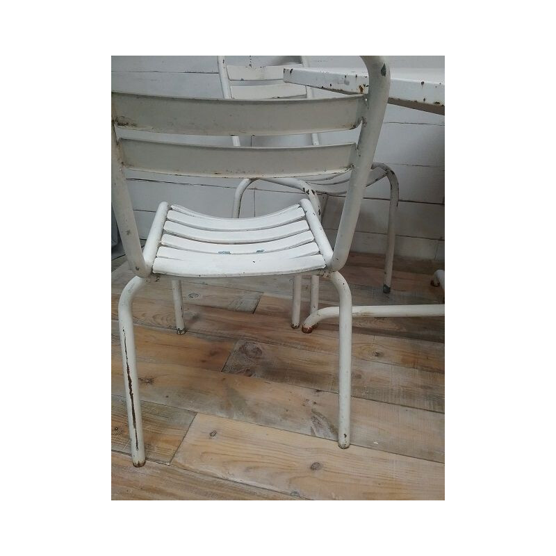 Set of 4 vintage chairs and a terrace table bistro Tolix 1950