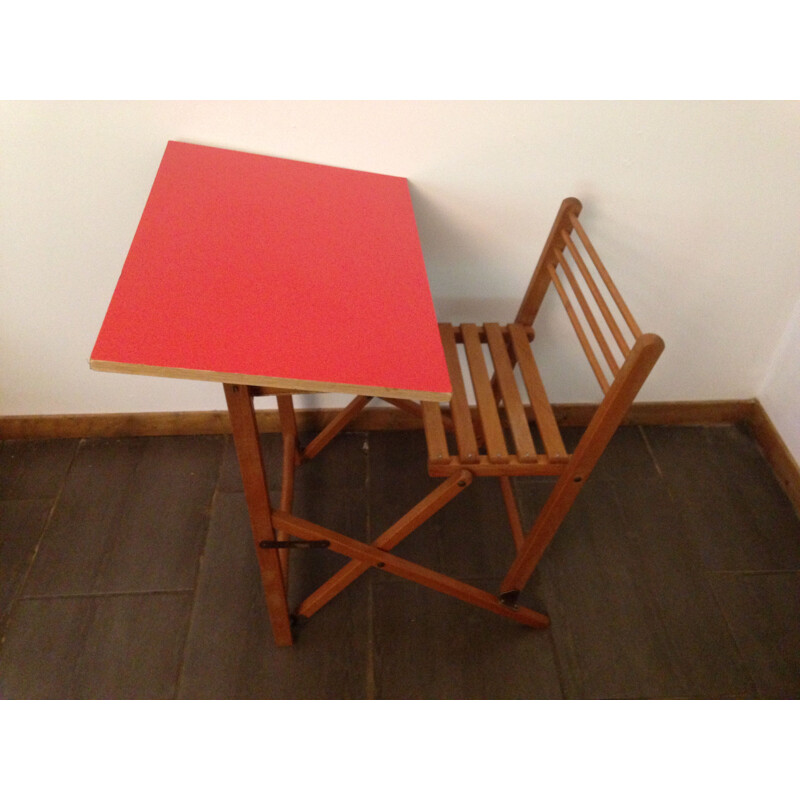 Vintage children's desk with red adhesive coating