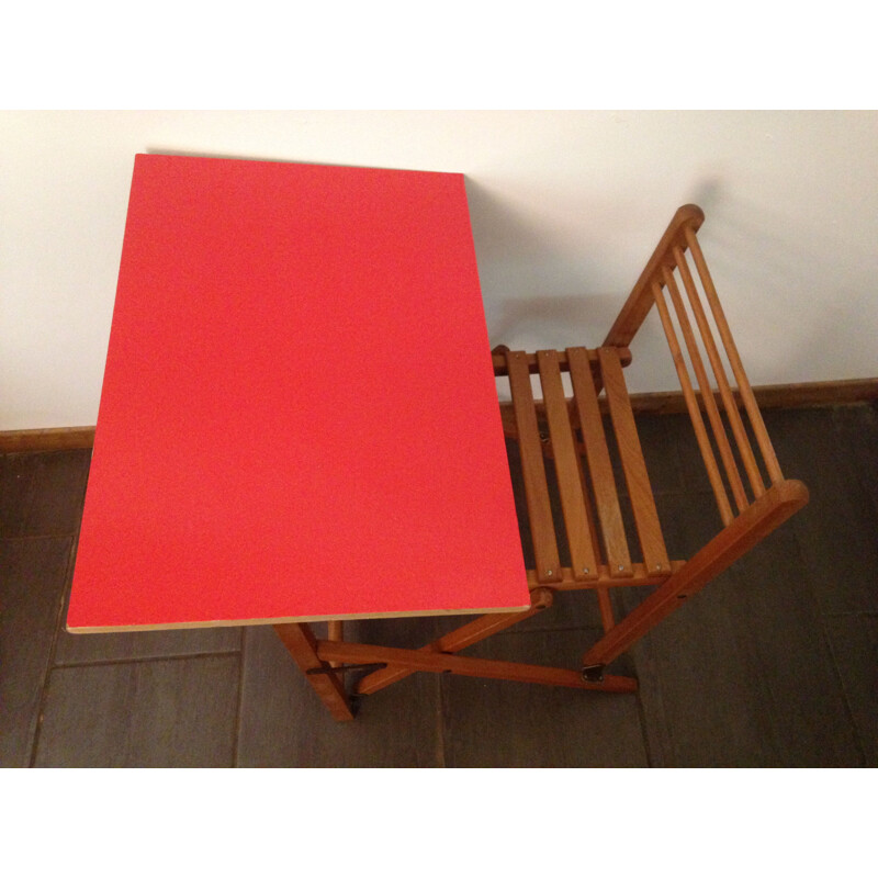 Vintage children's desk with red adhesive coating