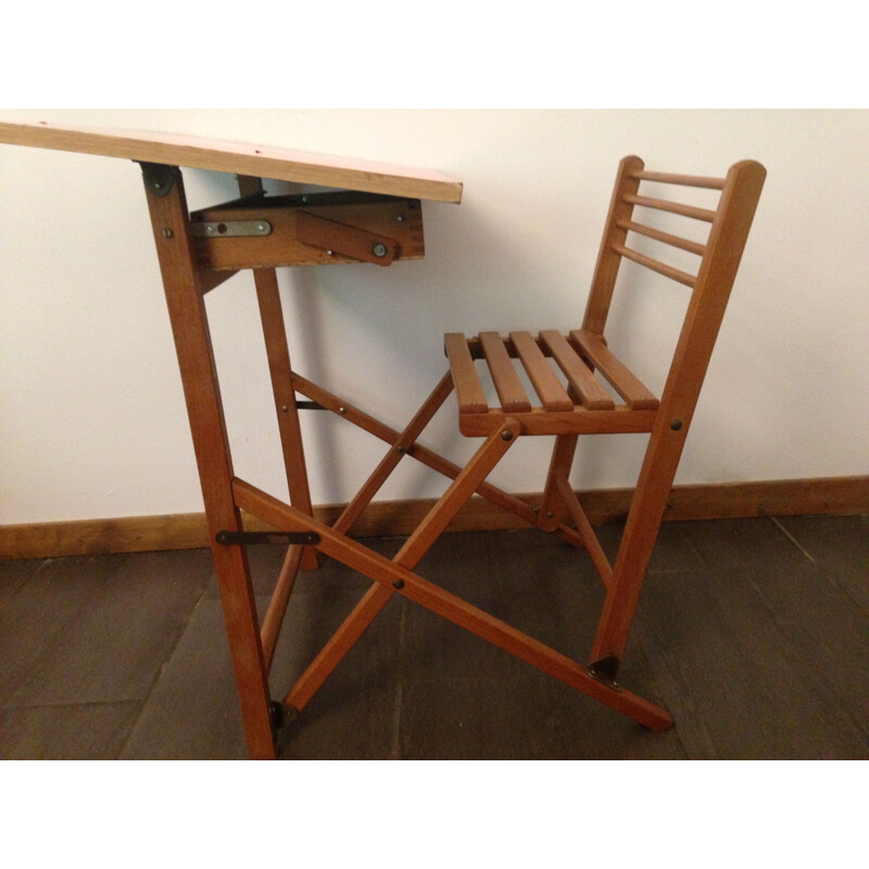 Vintage children's desk with red adhesive coating