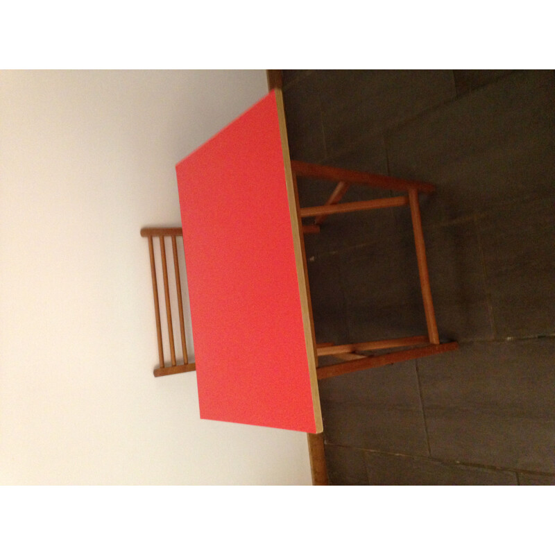Vintage children's desk with red adhesive coating