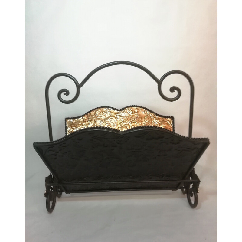 Vintage wrought iron folding magazine rack with patterned embossed interior