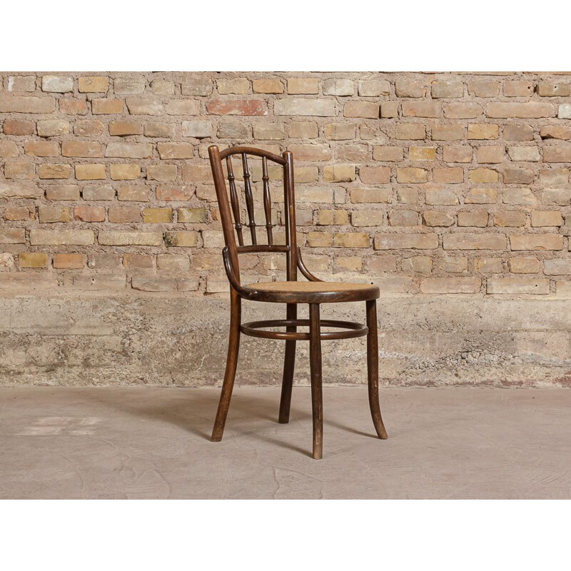 Vintage bistro chair in bent wood, turned and wickerwork seat 1950