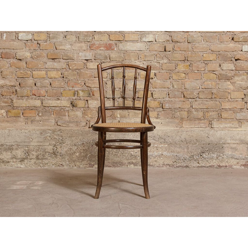 Vintage bistro chair in bent wood, turned and wickerwork seat 1950
