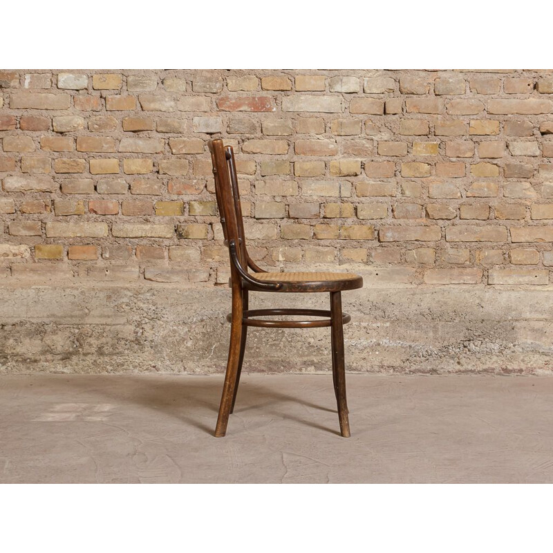 Vintage bistro chair in bent wood, turned and wickerwork seat 1950