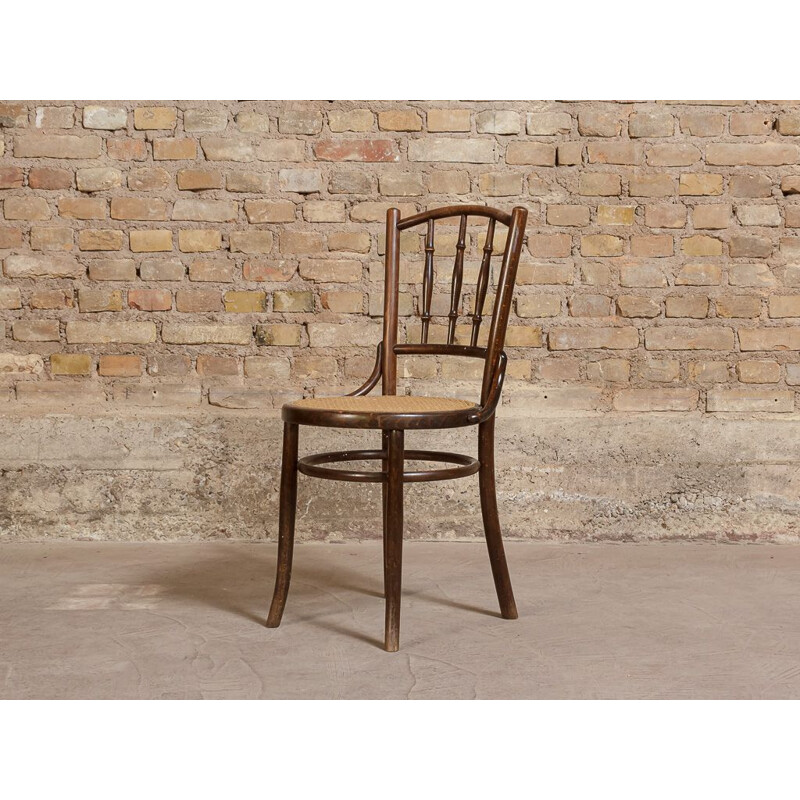 Vintage bistro chair in bent wood, turned and wickerwork seat 1950