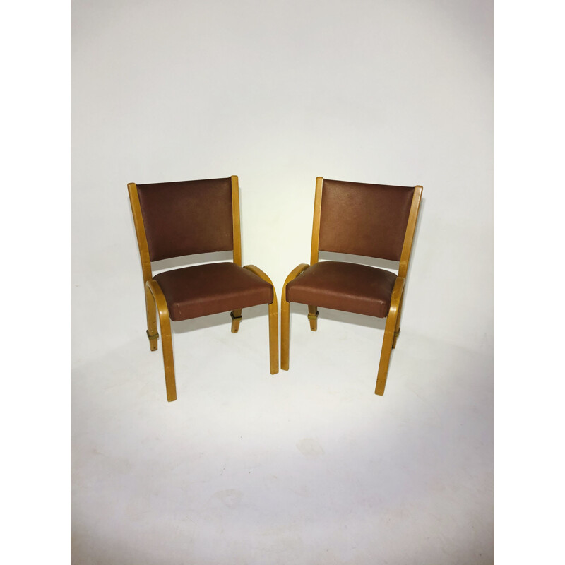 Pair of vintage Bow wood chairs by Steiner, in leatherette and wood 