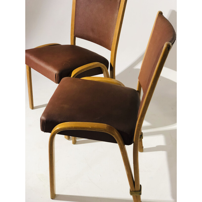 Pair of vintage Bow wood chairs by Steiner, in leatherette and wood 