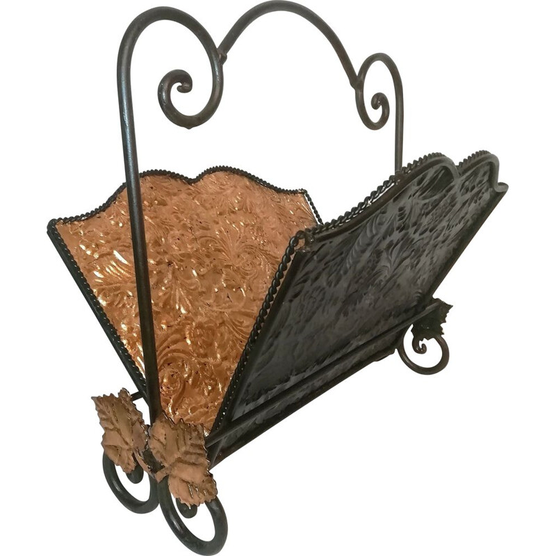 Vintage wrought iron folding magazine rack with patterned embossed interior