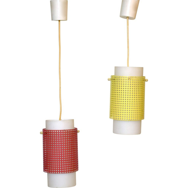 Pair of vintage red and yellow perforated metal hangers, 1950