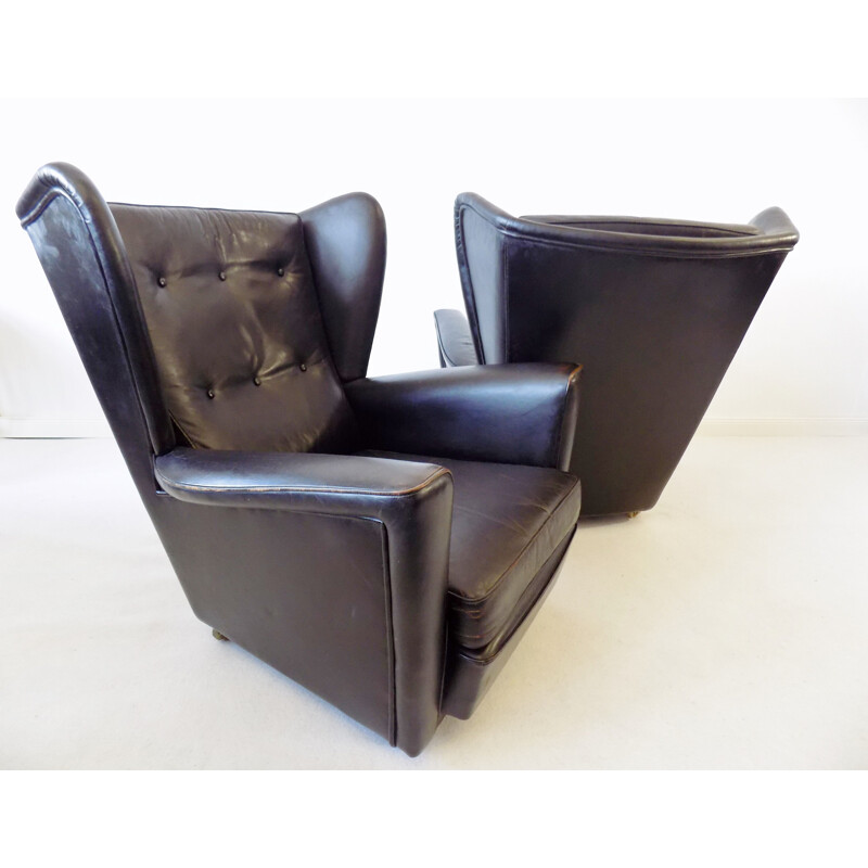 Pair  of vintage black leather wingback chairs Howard Keith for HK furniture