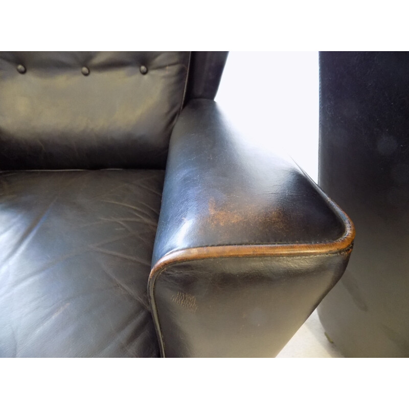 Pair  of vintage black leather wingback chairs Howard Keith for HK furniture