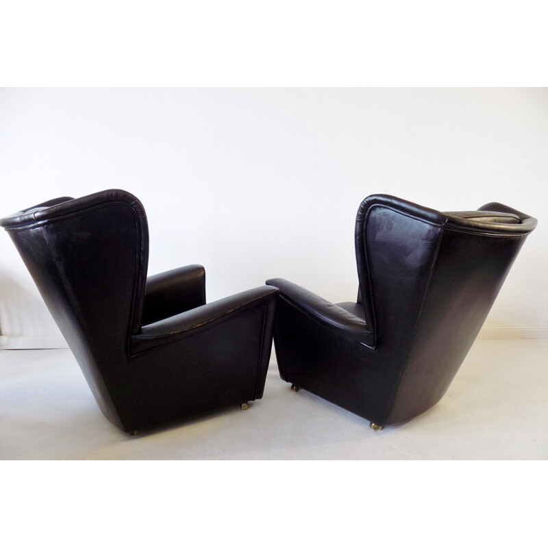 Pair  of vintage black leather wingback chairs Howard Keith for HK furniture