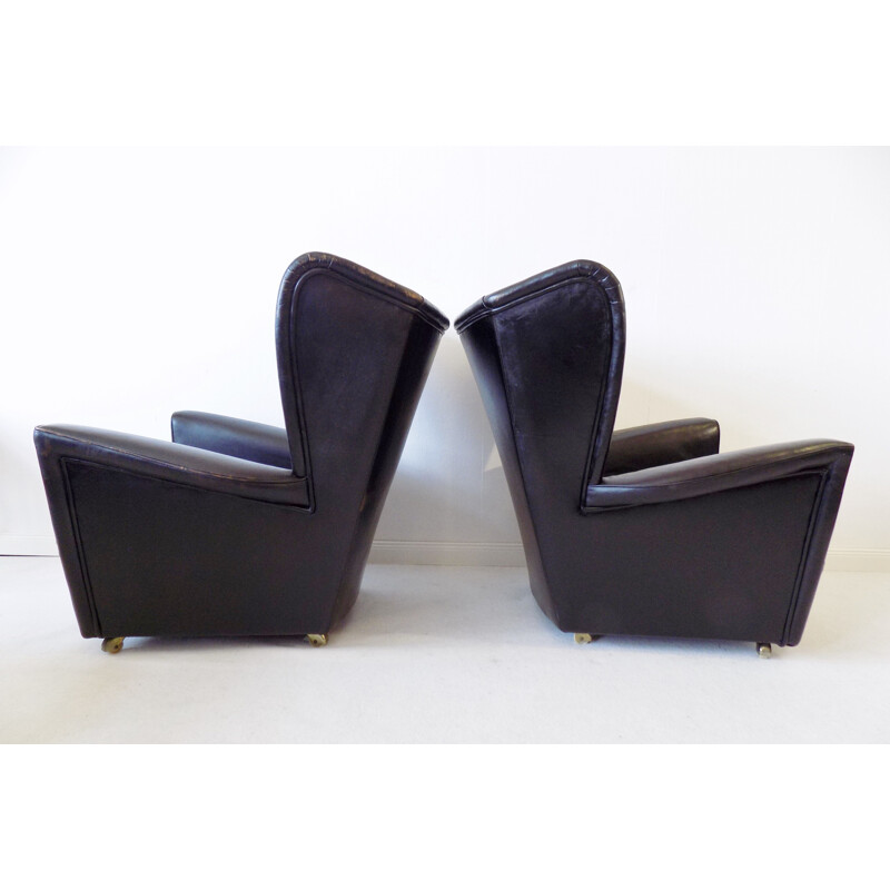 Pair  of vintage black leather wingback chairs Howard Keith for HK furniture