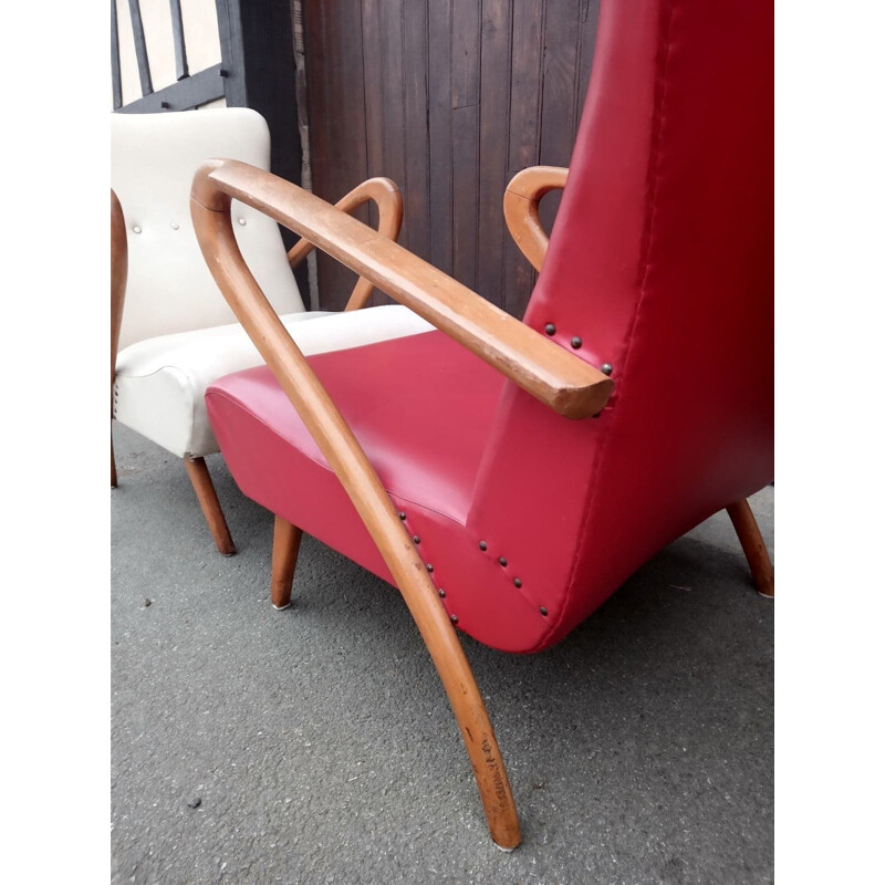 Paire de fauteuils de salon vintage en bois et simili cuir italiens