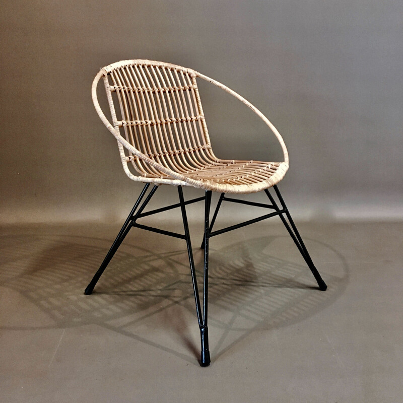 Vintage metal and rattan armchair