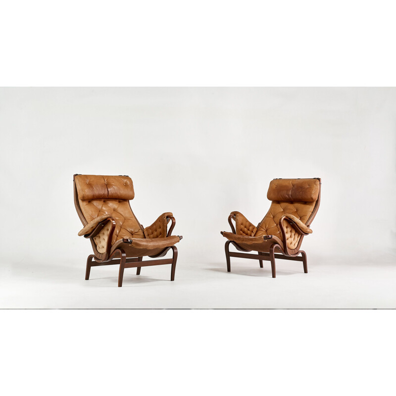 Bruno Mathsson pour Dux, paire de fauteuils et ottomans 