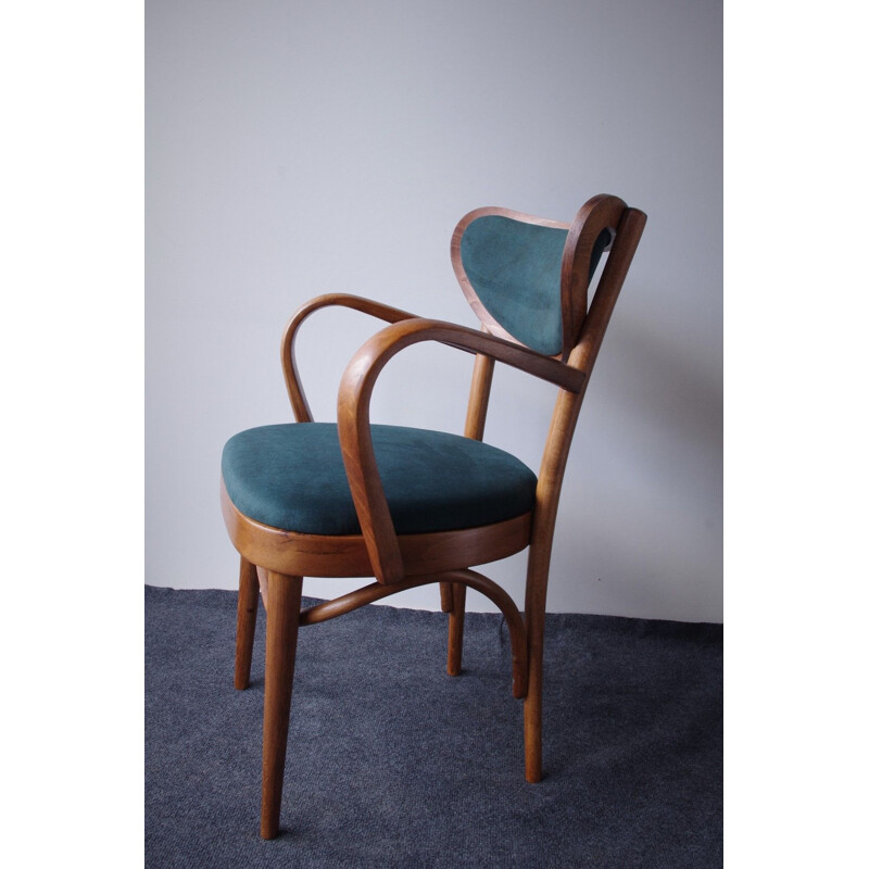Chaise vintage rembourrée  et élégante 1960