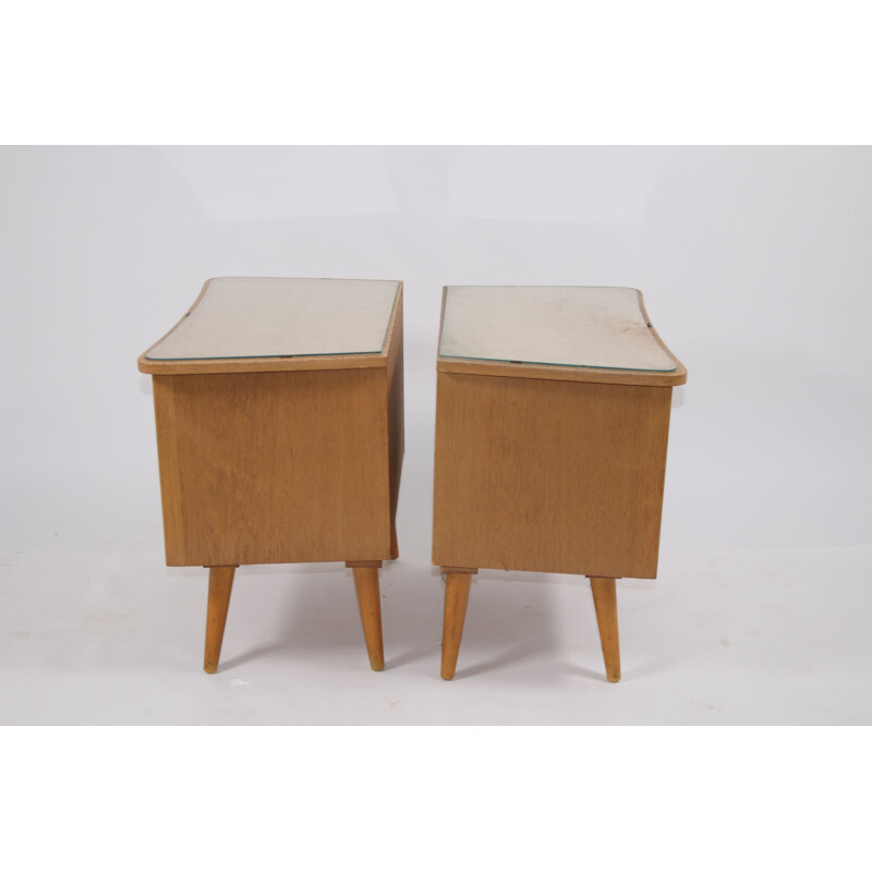 Pair of bedside tables with glass top German 1960s