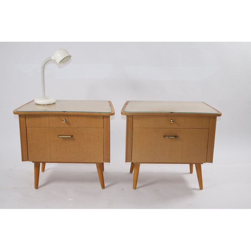 Pair of bedside tables with glass top German 1960s