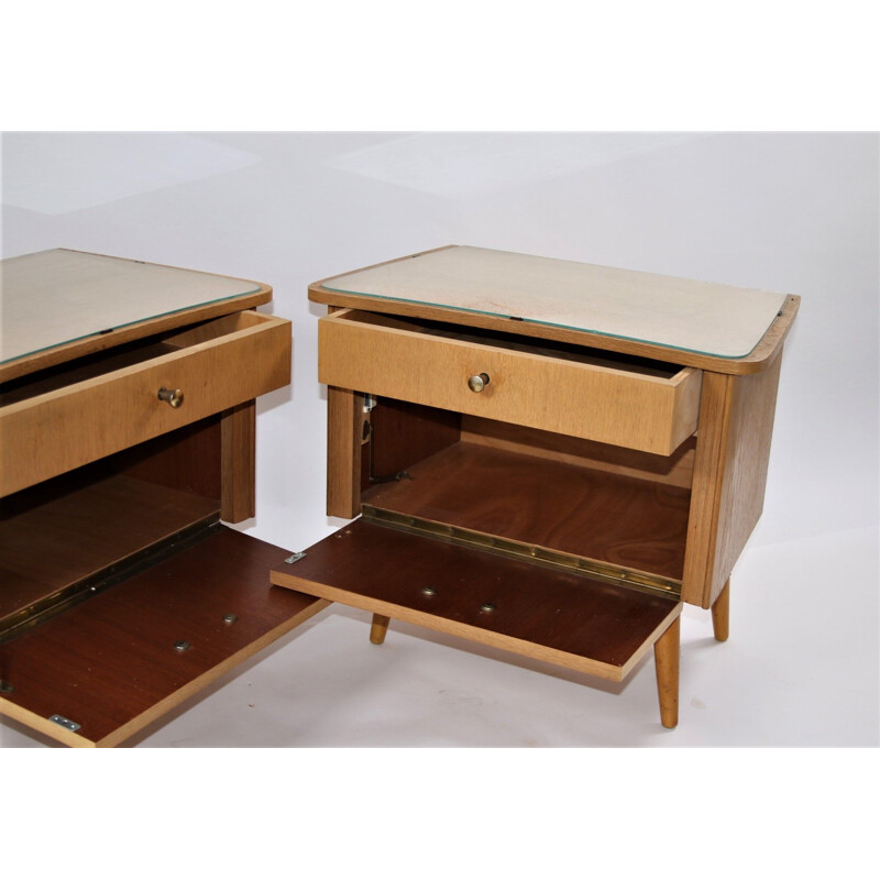 Pair of bedside tables with glass top German 1960s