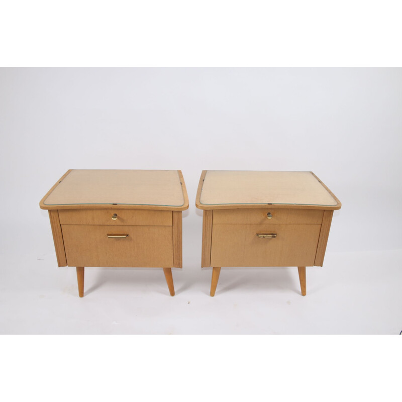 Pair of bedside tables with glass top German 1960s