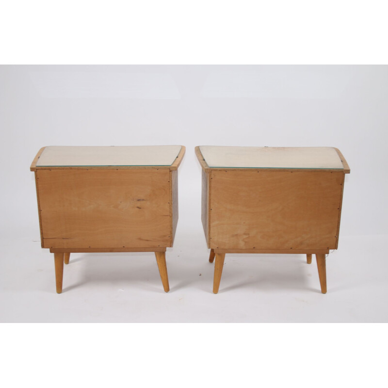 Pair of bedside tables with glass top German 1960s