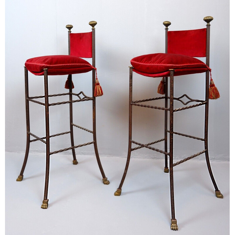 Pair of vintage wrought iron and red velvet bar stools