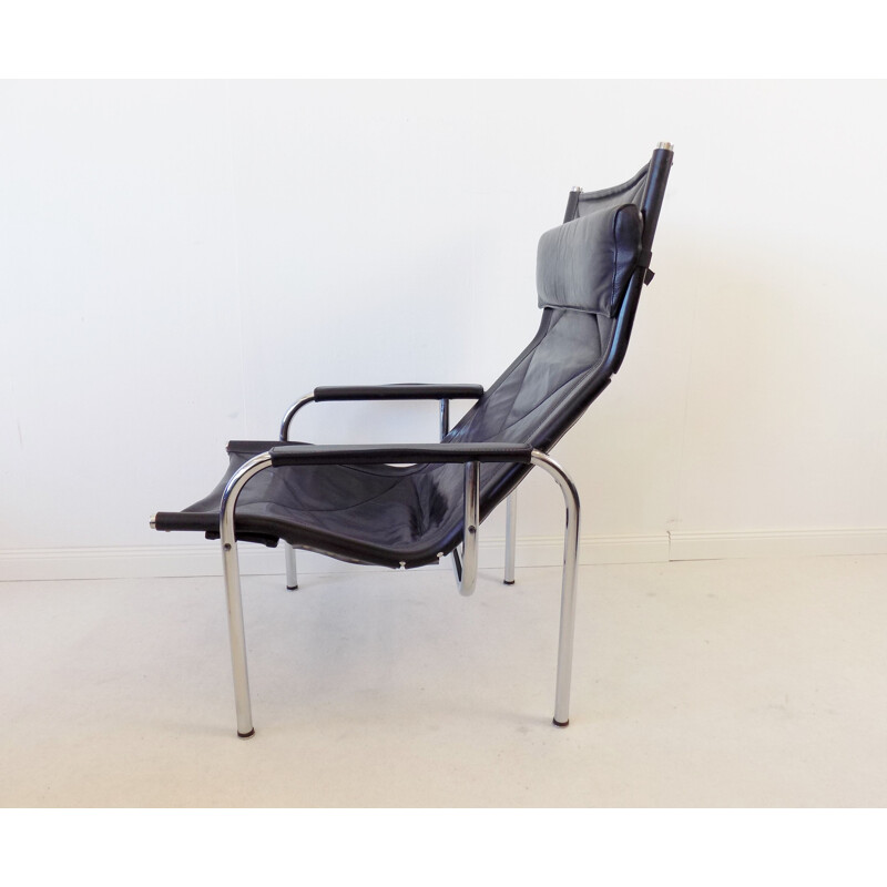 Vintage Strässle HE1106 black Leather Loungechair with ottoman by Hans Eichenberger 1960