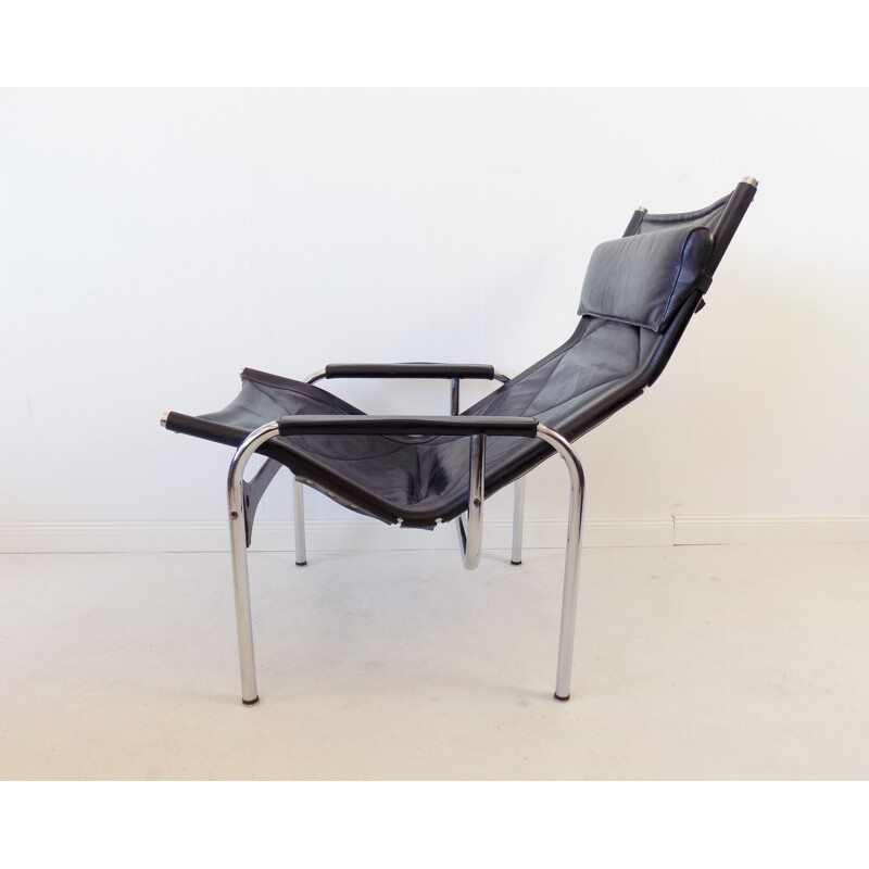 Vintage Strässle HE1106 black Leather Loungechair with ottoman by Hans Eichenberger 1960