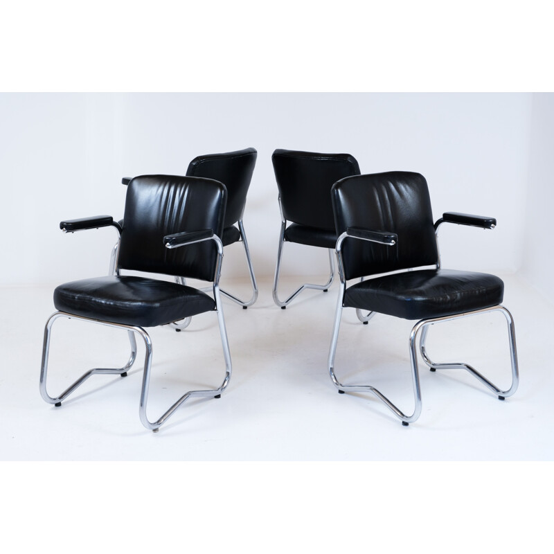 Suite of 4 vintage Bauhaus leather and skai chairs 