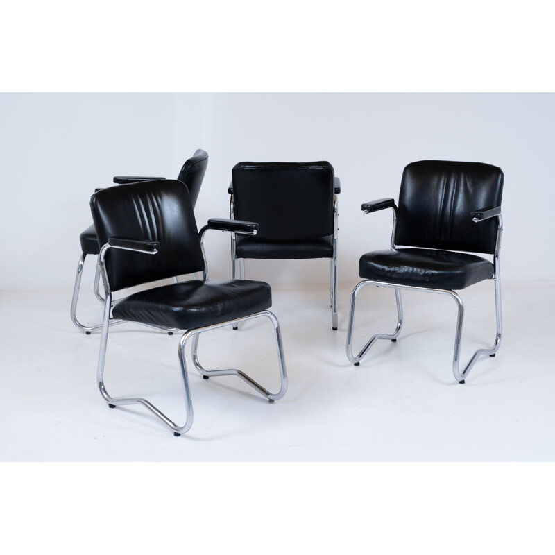 Suite de 4 chaises vintage Bauhaus en cuir et skai 