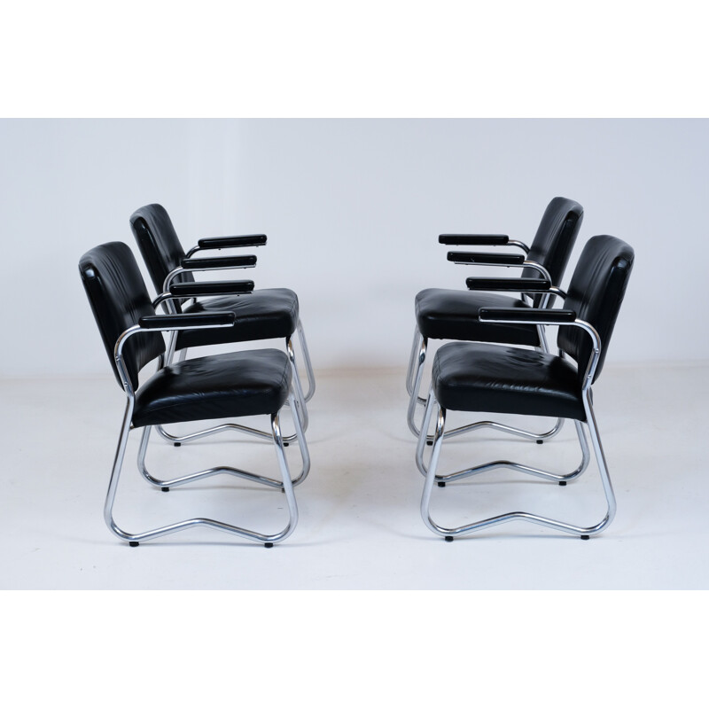Suite of 4 vintage Bauhaus leather and skai chairs 