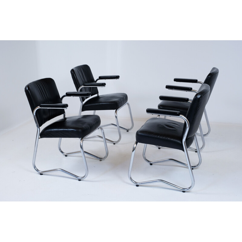 Suite de 4 chaises vintage Bauhaus en cuir et skai 