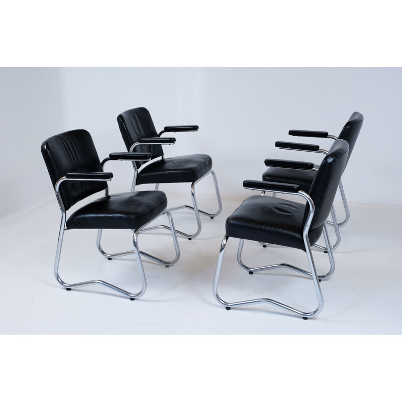 Suite of 4 vintage Bauhaus leather and skai chairs 