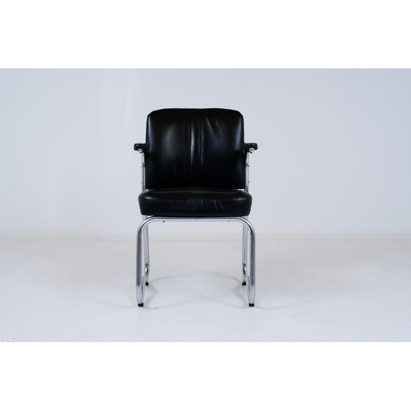 Suite de 4 chaises vintage Bauhaus en cuir et skai 