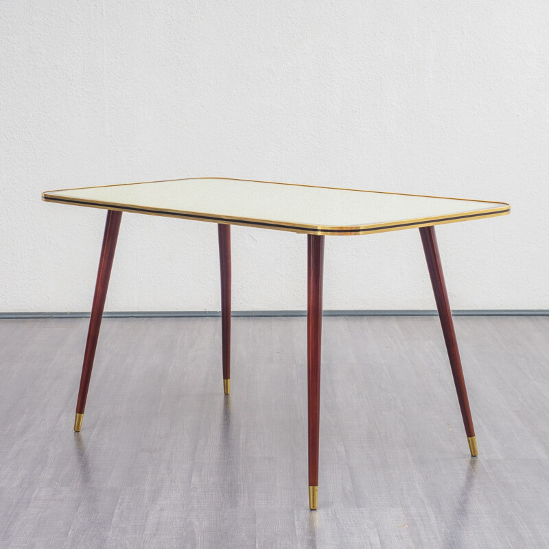 Vintage cocktail table with glass top and graphic pattern 1950s