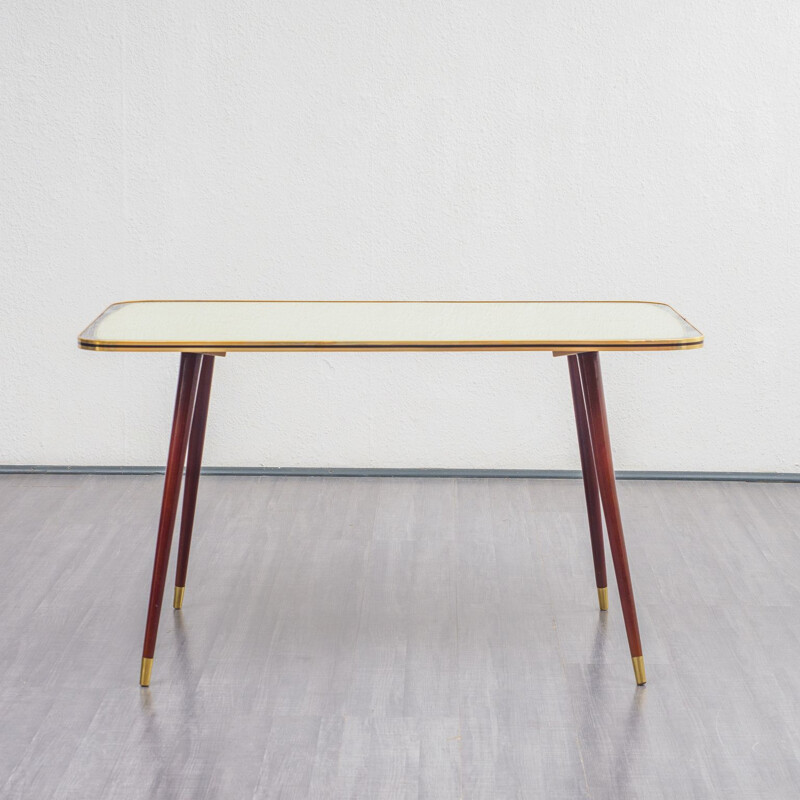 Vintage cocktail table with glass top and graphic pattern 1950s