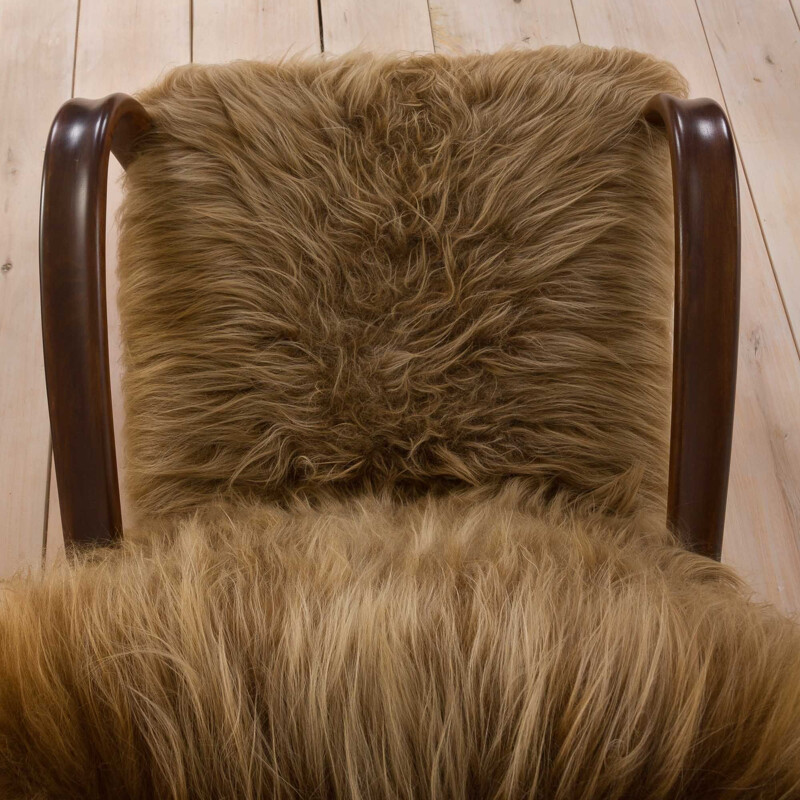 Vintage lounge chair in long hair sheepskin Halabala 269, 1930s